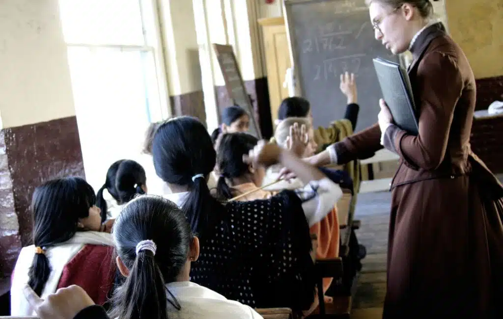 A lesson taking place in the Victorian Schoolroom at the Ragged School Museum
