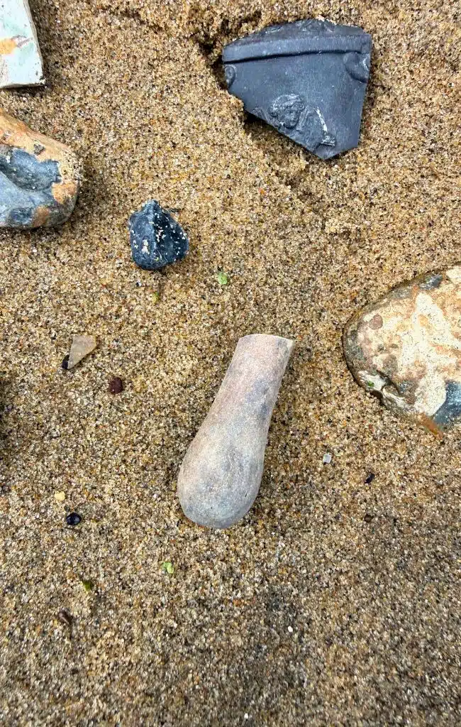 Half a Georgian wig curler found mudlarking in London